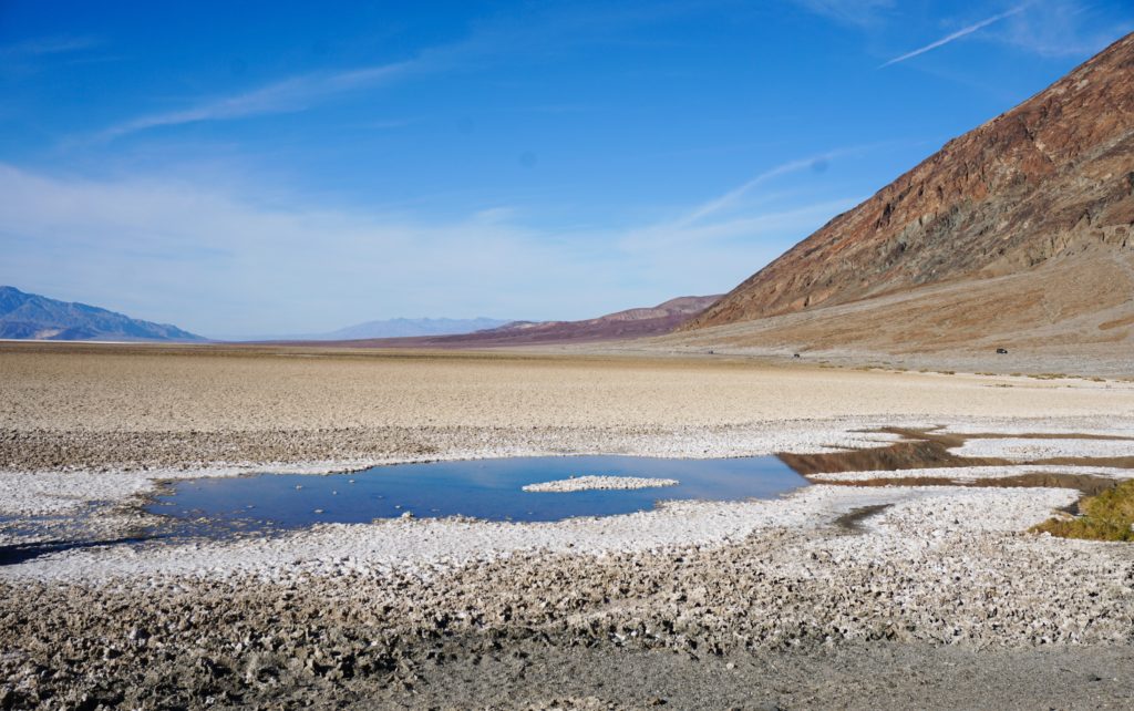 Small pool of water at Badwater Basin in Death Valley National Park, California