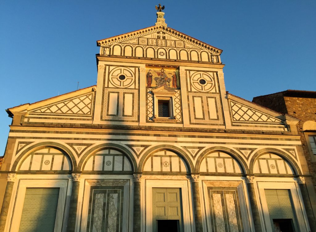 The Basilica di San Miniato al Monte is a great place to catch sunset in Florence, Italy