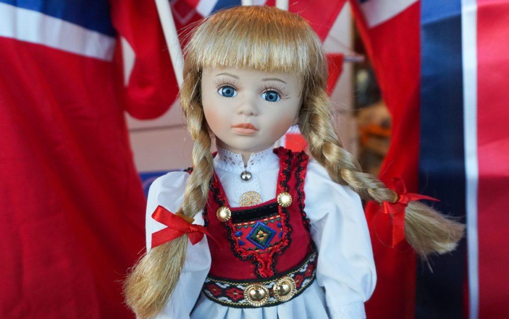 A beautiful Norwegian doll in a storefront in Bryggen Bergen, Norway