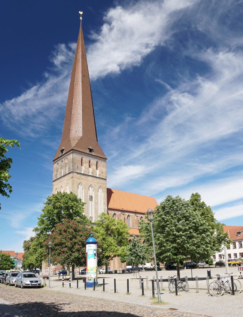 The pointy spire of Petrikirche in Rostock Germany