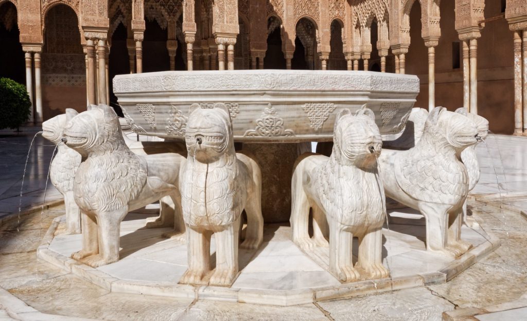 The Fountain of the Lions in the Nasrid Palaces Alhambra Granada Spain