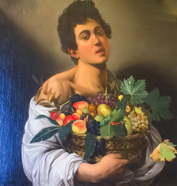 Boy with a Basket of Fruit by Caravaggio at the Borghese Gallery in Rome, Italy