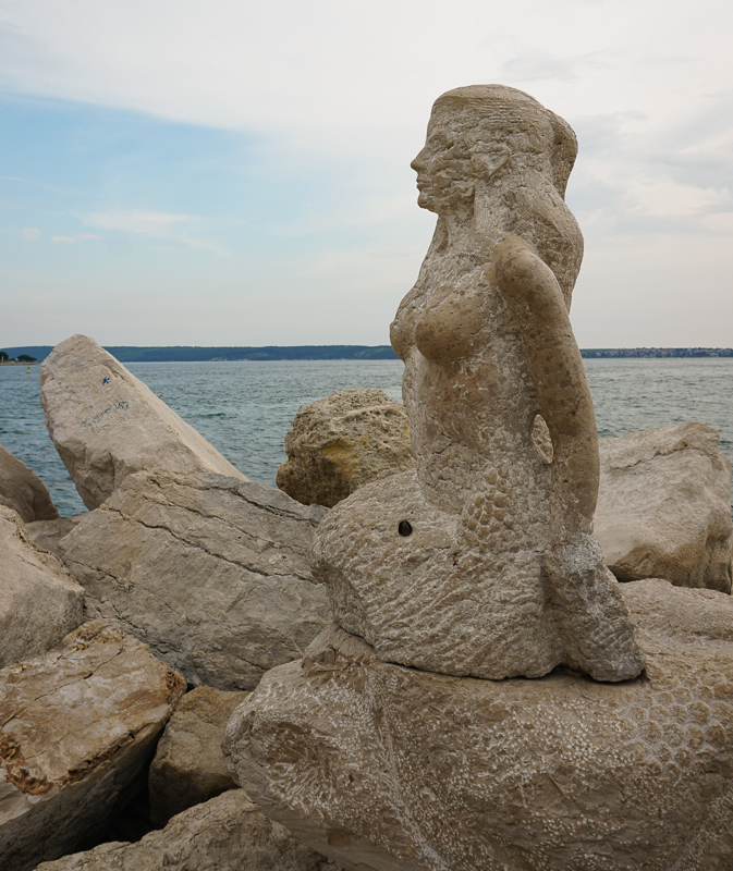 A mermaid sculpture along the waterfront in Piran Slovenia