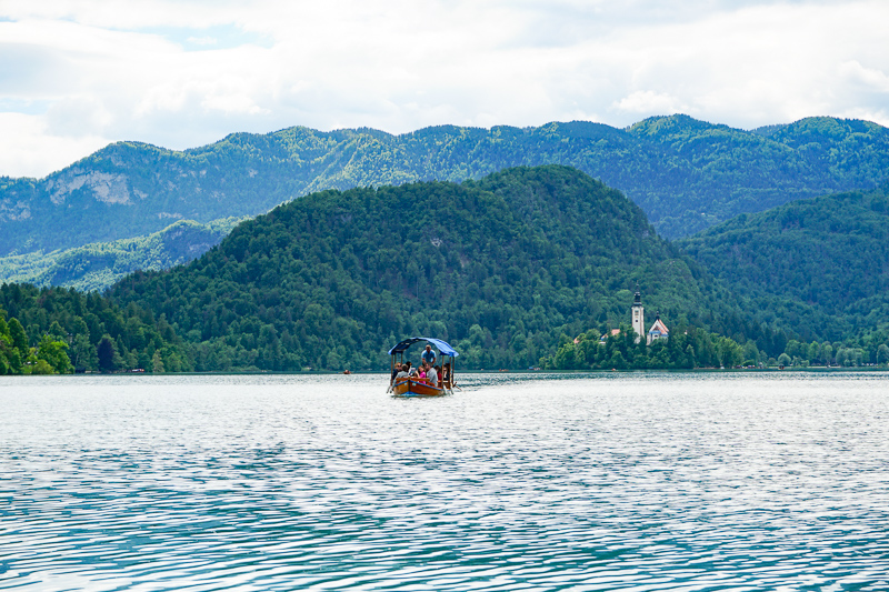 A pletna boat carrying visitors to Bled Island in lake Bled, Slovenia