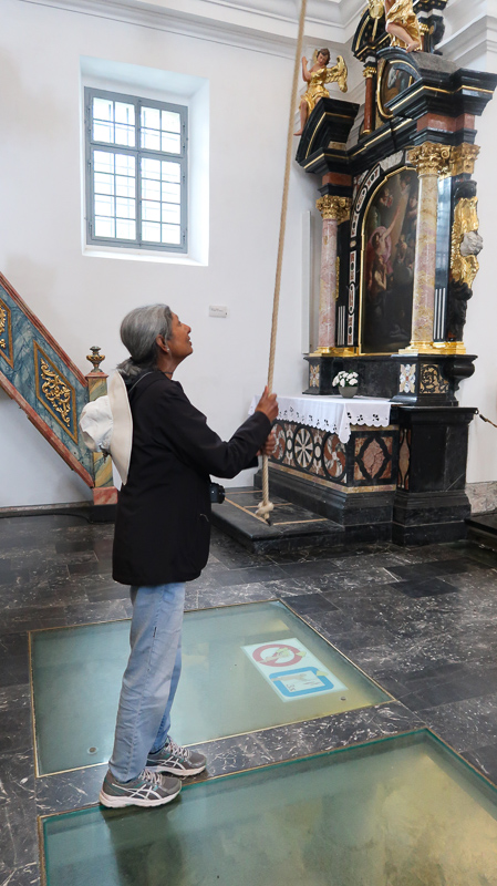 Ringing the bell at the church on Bled Island 