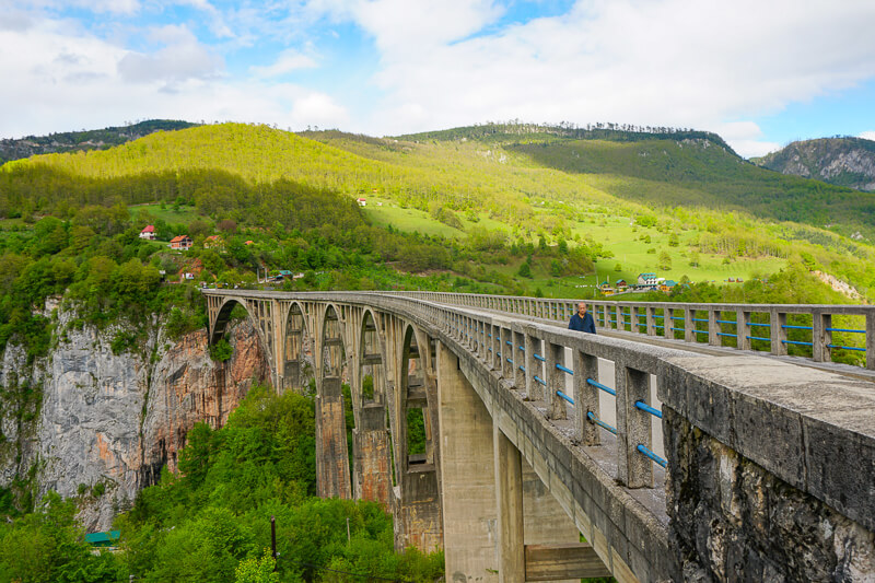 Walking Tara Canyon Bridge in Durmitor National Park Montenegro