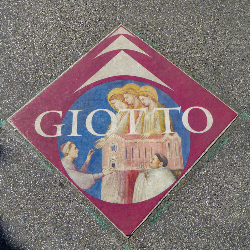 Sign on pavement in Padua Italy