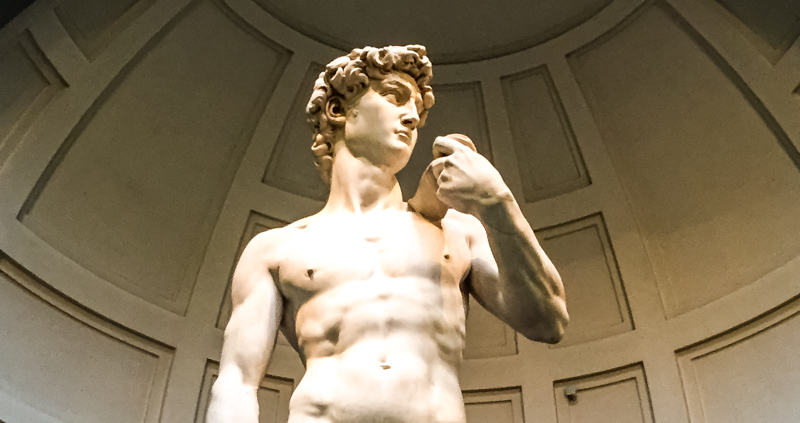 Michelangelo's David at the Accademia Gallery in Florence, Italy can be seen on a day trip from Bologna!