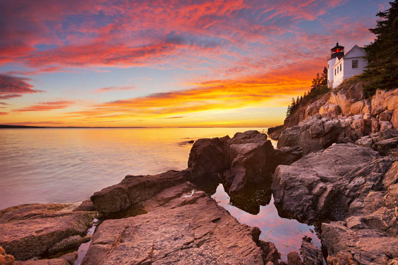 Bass harbor Lighthouse in Acadia NP at Sunset. Acadia NP is one of the best places to visit in New England.