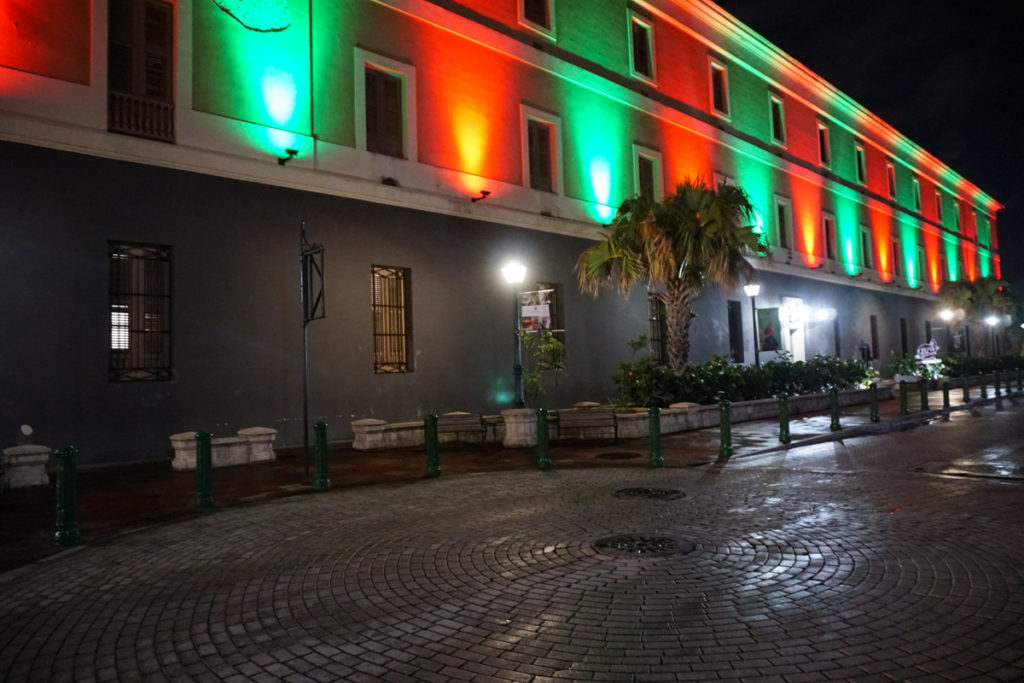 The Old Barracks building in Old San Juan, lit up at night