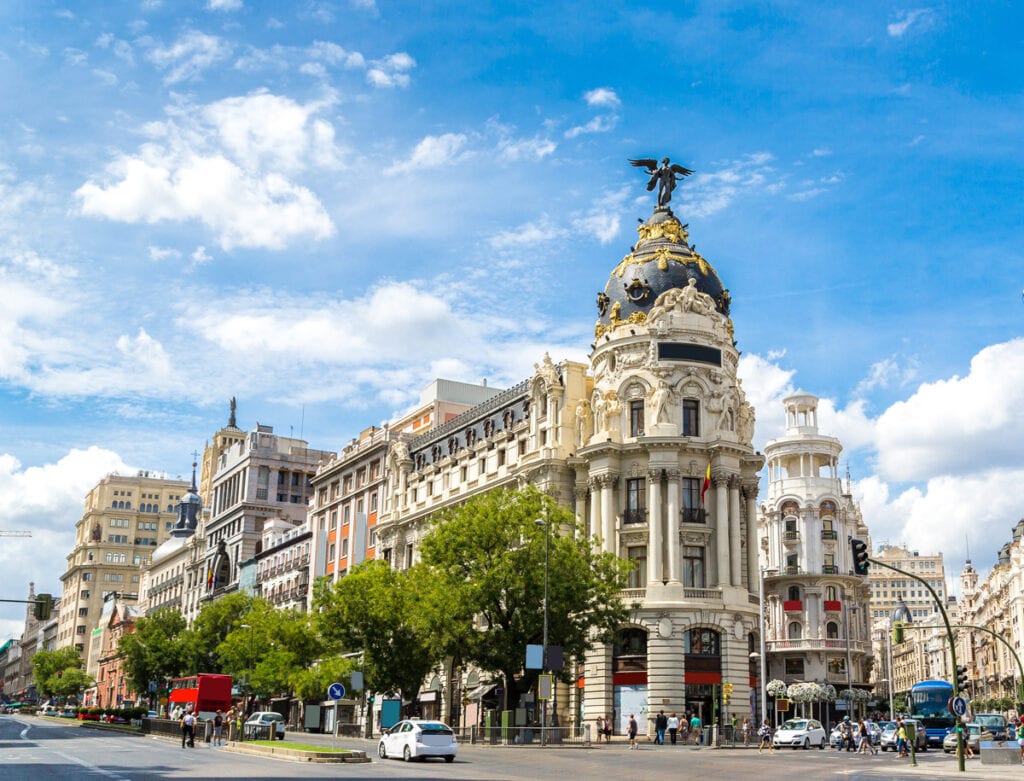The Metropolis and the Edificio Grassy on Gran Via in Madrid, Spain